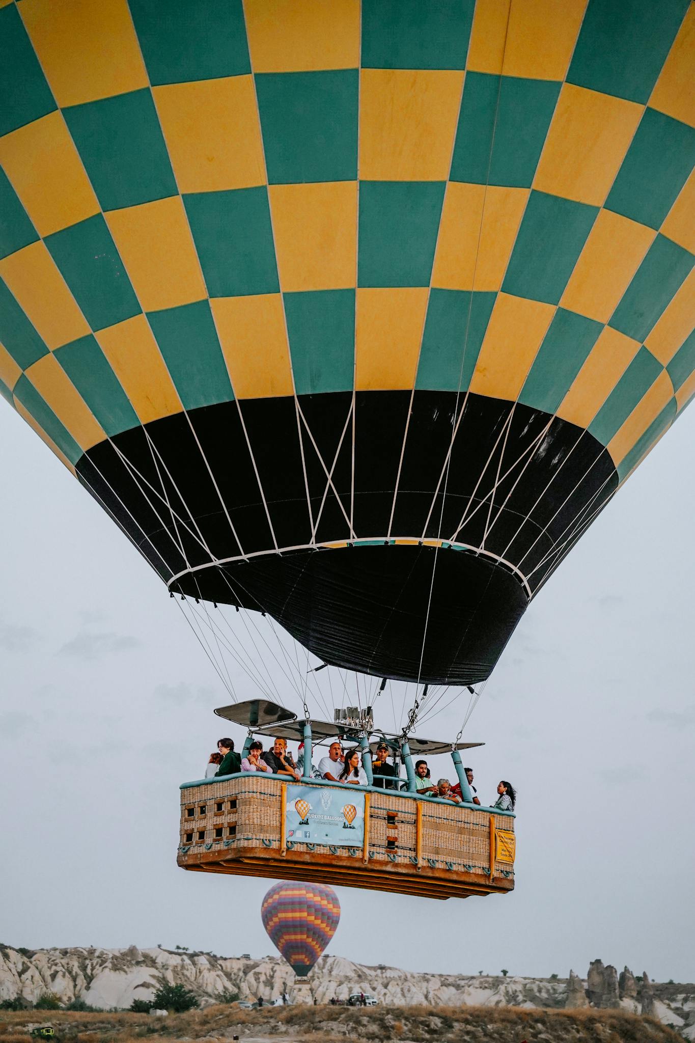 Hot air balloon soaring in Cappadocia, Turkey. Perfect for adventure travel enthusiasts.